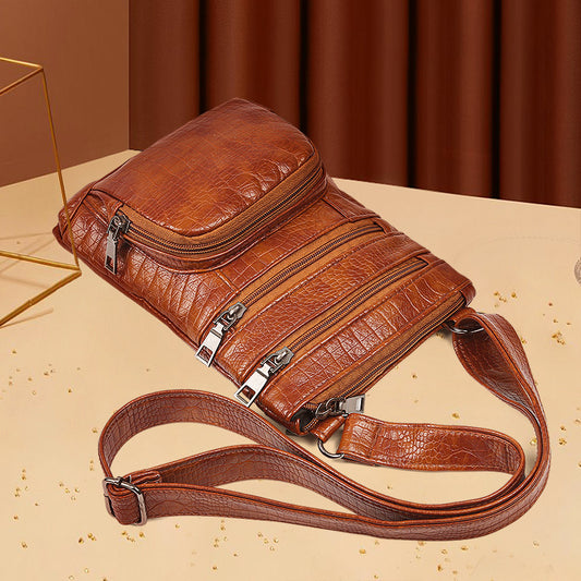 Women's Crossbody Bag with Multiple Zippered Compartments and Croc-Embossed Texture